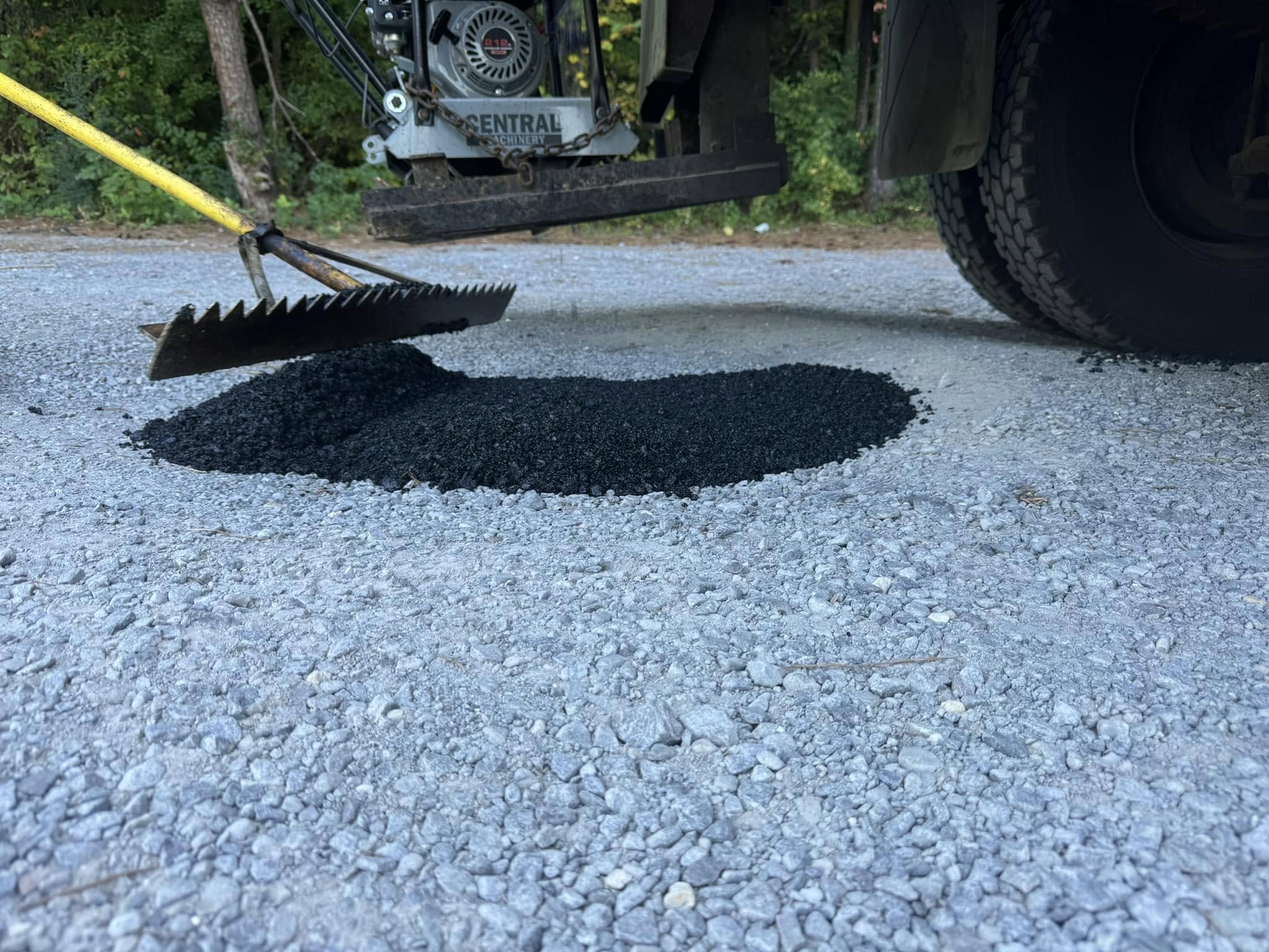 Pothole filling in progress